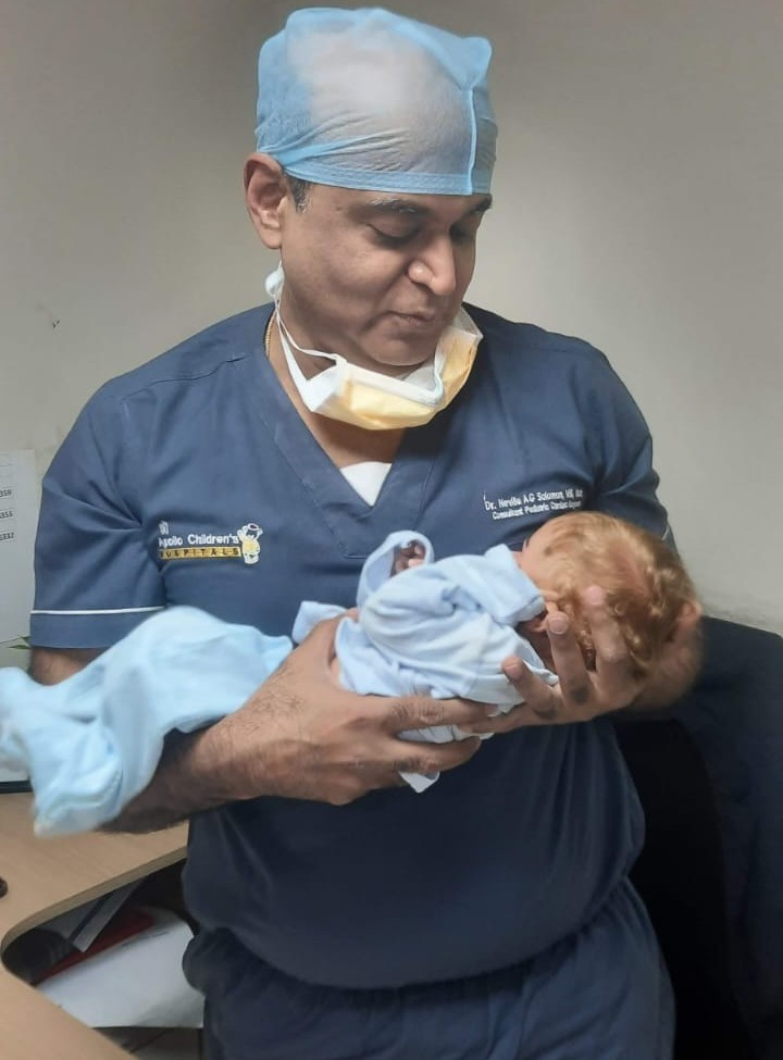 Dr. Neville Solomon
